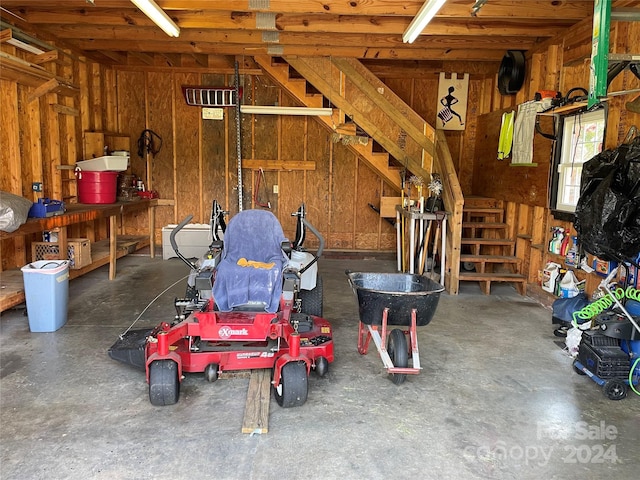 garage with wood walls