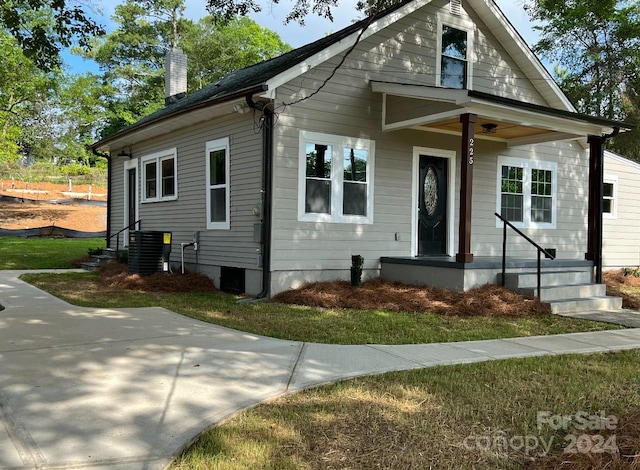 bungalow-style house featuring central AC