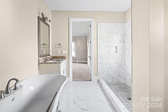 full bath with marble finish flooring, a soaking tub, a tile shower, vanity, and baseboards