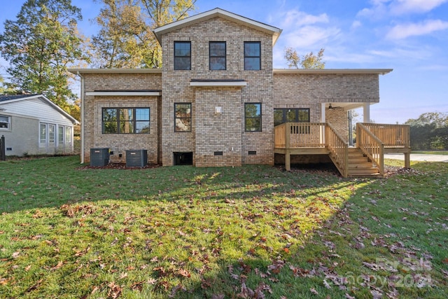 rear view of property featuring crawl space, central AC unit, brick siding, a lawn, and a wooden deck
