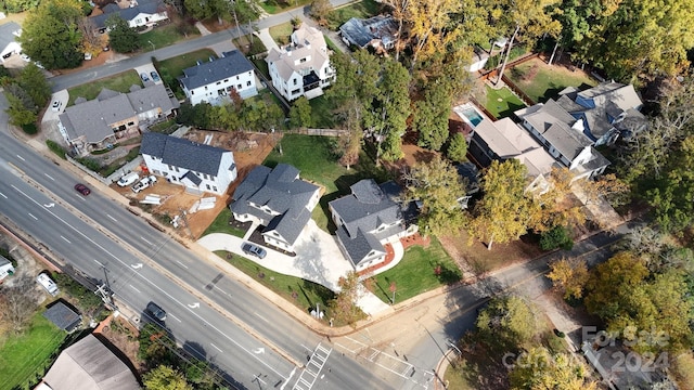 aerial view of property's location featuring nearby suburban area