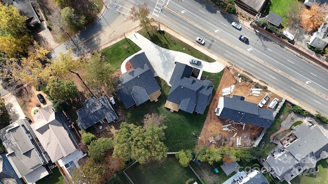 aerial overview of property's location featuring nearby suburban area