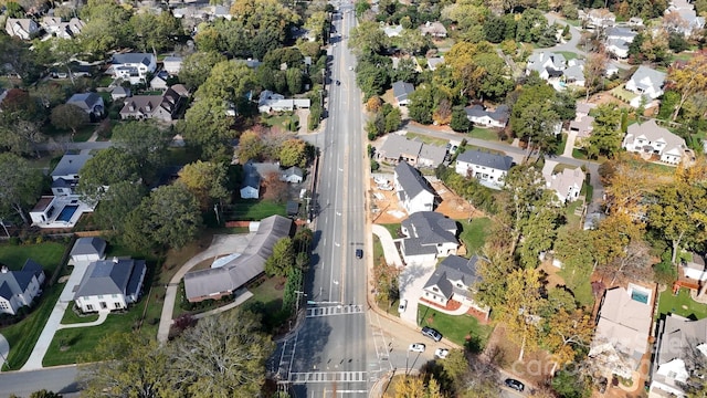 aerial view of property's location with nearby suburban area