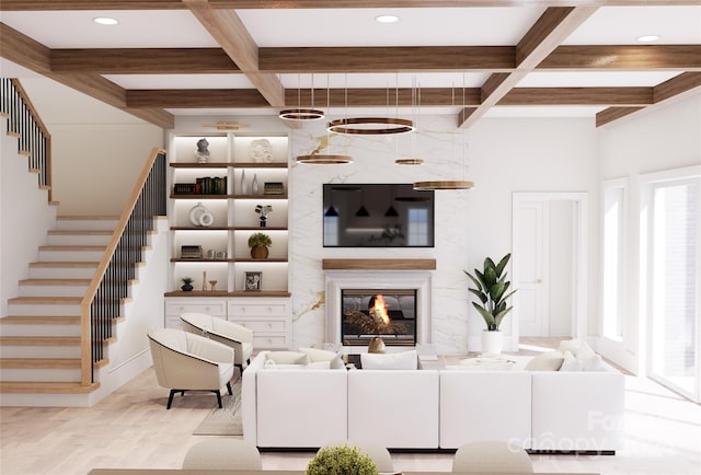 living room with light hardwood / wood-style flooring, beam ceiling, a high end fireplace, and coffered ceiling