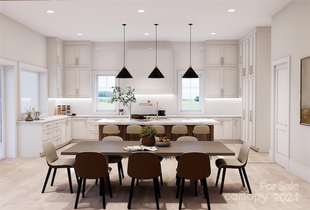 dining area with light hardwood / wood-style floors