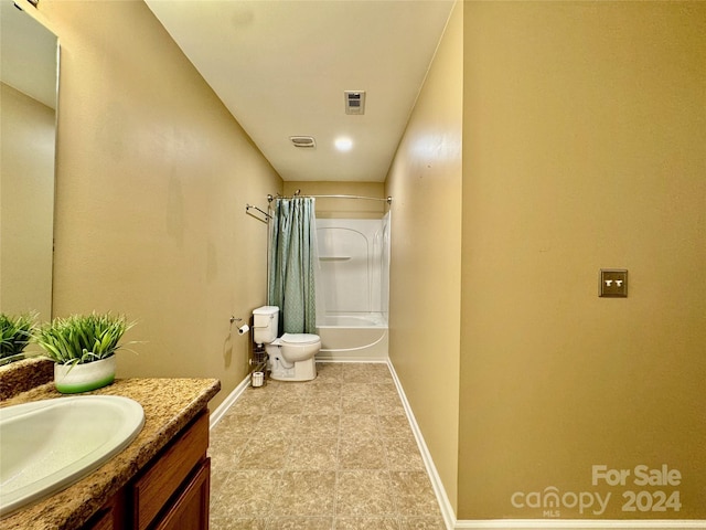 full bathroom with toilet, vanity, and shower / tub combo with curtain