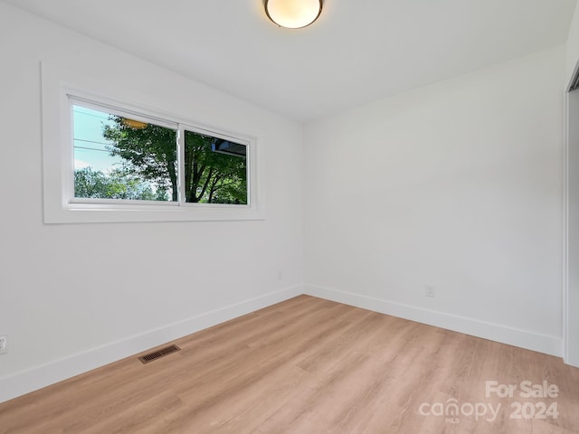 empty room featuring light hardwood / wood-style floors