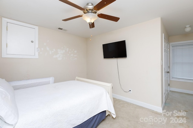 carpeted bedroom with ceiling fan