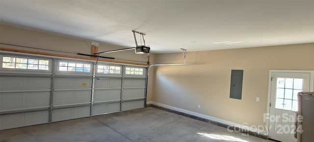 garage featuring a garage door opener, electric panel, and water heater