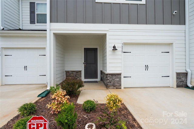 entrance to property with a garage