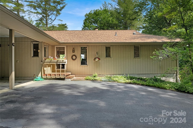 rear view of property with a patio area