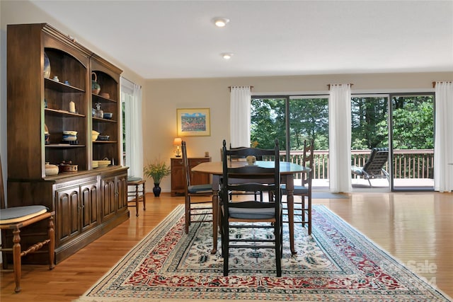 dining room with light wood-type flooring