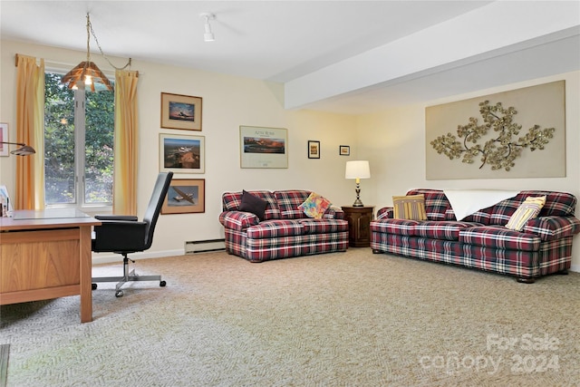 carpeted living room featuring baseboard heating and plenty of natural light