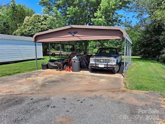 view of parking featuring a carport and a yard