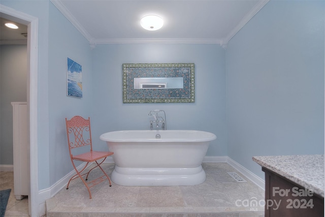 bathroom with a tub to relax in, vanity, and crown molding