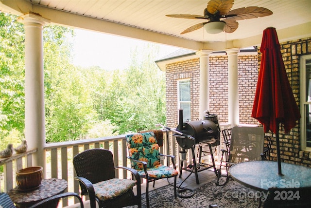 view of patio / terrace with ceiling fan and grilling area