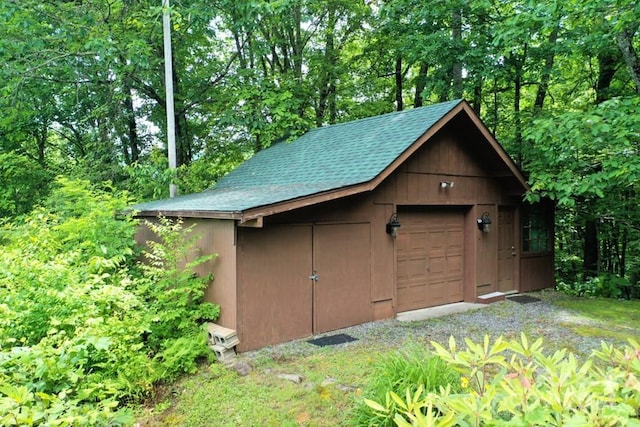 view of outbuilding with a garage