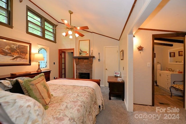 bedroom featuring ceiling fan, carpet, a fireplace, and high vaulted ceiling