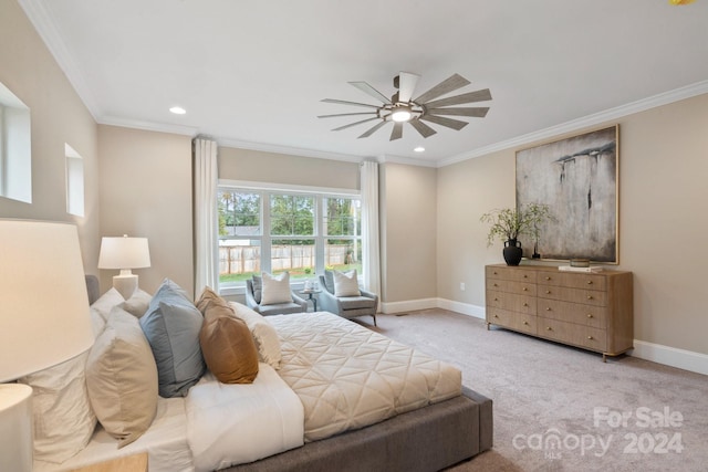 bedroom featuring ceiling fan, crown molding, and light carpet