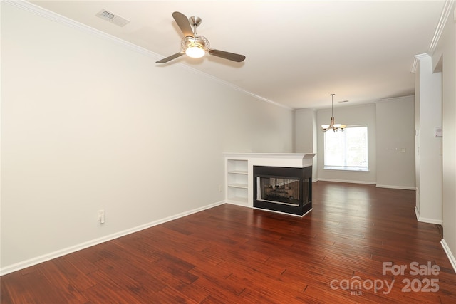 unfurnished living room featuring visible vents, dark wood finished floors, crown molding, and a multi sided fireplace