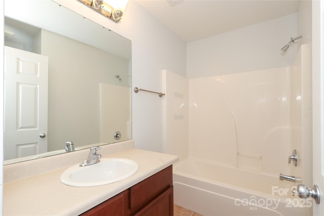 full bathroom featuring tub / shower combination and vanity