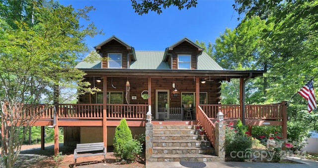 cabin featuring a porch