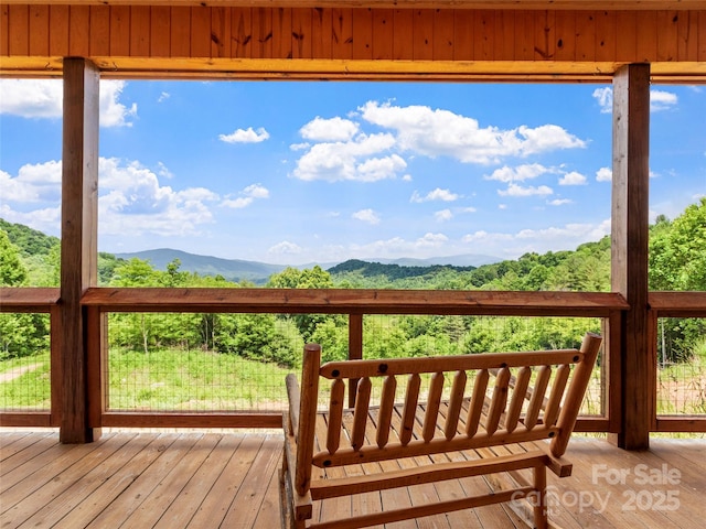 exterior space with a healthy amount of sunlight and a mountain view