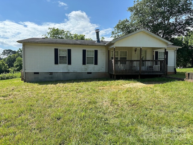 view of front of home with a front lawn and covered porch