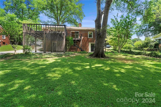 view of yard with a deck