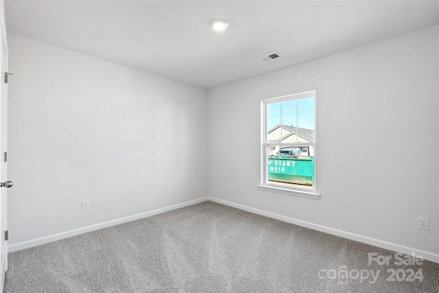 view of carpeted spare room