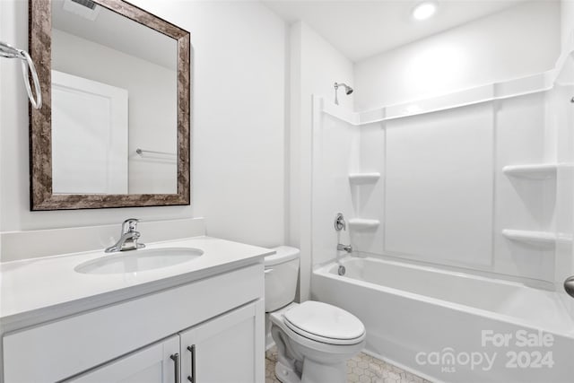 full bathroom featuring vanity, toilet, and bathtub / shower combination