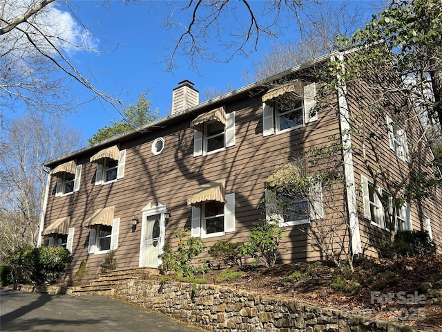 16 Cedar Dr, Mills River, NC 28759 - colonial home featuring a chimney