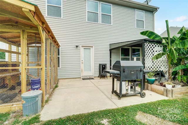 rear view of house featuring a patio