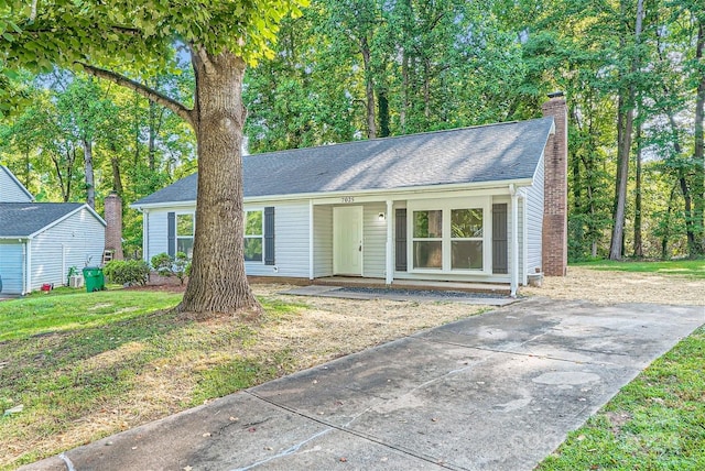 view of front of home with a front yard