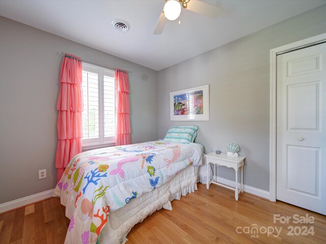 bedroom featuring ceiling fan and hardwood / wood-style floors