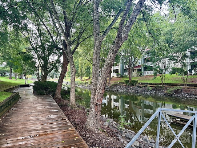 dock area featuring a water view