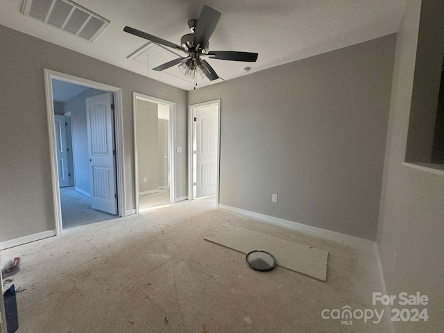 interior space featuring ceiling fan