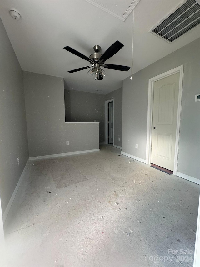 spare room with ceiling fan