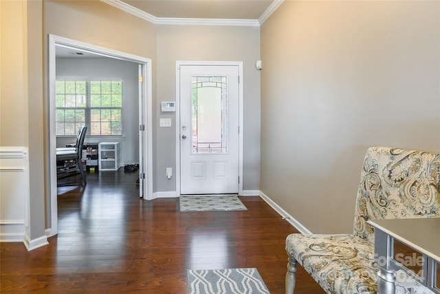 foyer featuring dark hardwood / wood-style floors and ornamental molding