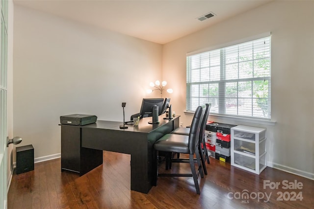 office with dark hardwood / wood-style flooring