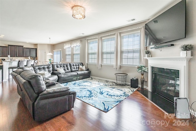 living room featuring dark hardwood / wood-style floors