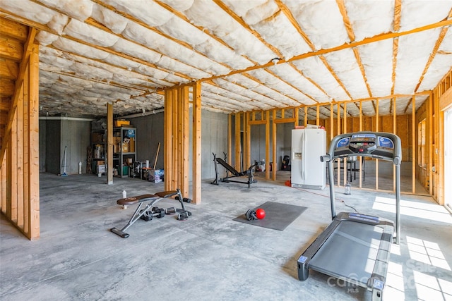 exercise room featuring water heater