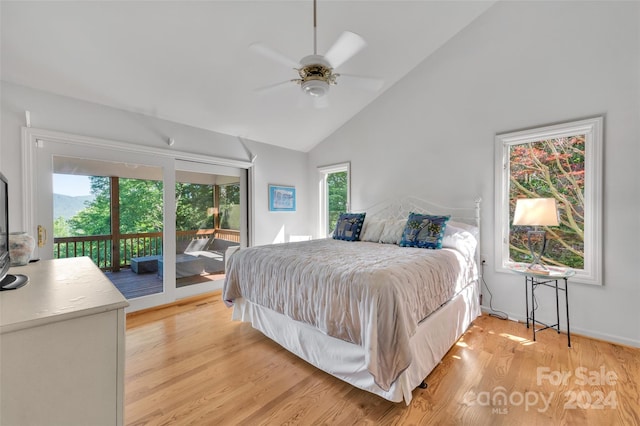 bedroom featuring ceiling fan, access to exterior, light wood-type flooring, and high vaulted ceiling