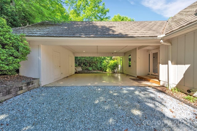 view of parking / parking lot with a carport