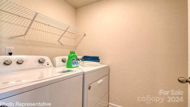 washroom featuring independent washer and dryer