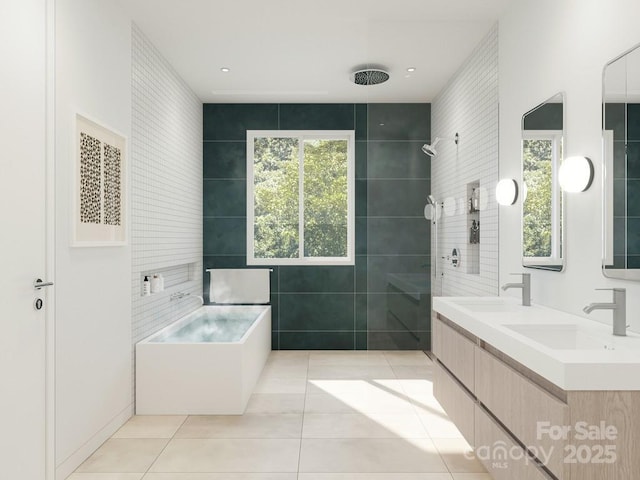 bathroom with a sink, tile patterned floors, a garden tub, and tiled shower