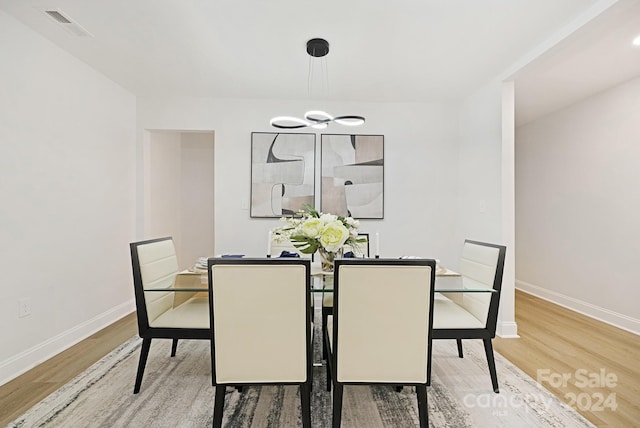 dining room featuring wood-type flooring