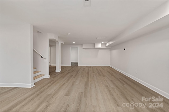 basement with light wood-type flooring