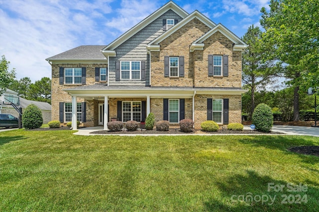 view of front of house with a front yard