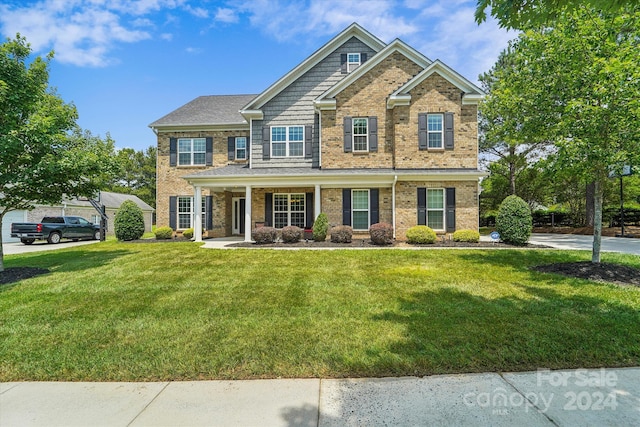 view of front of home featuring a front yard